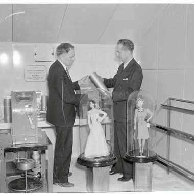 Dr. TK Peters and Dr. Thornwell Jacobs examining obejcts in the Crypt of Civilization
