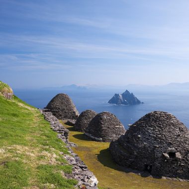 Beehive huts on Skellig Michael, looking across to Little Skellig. 