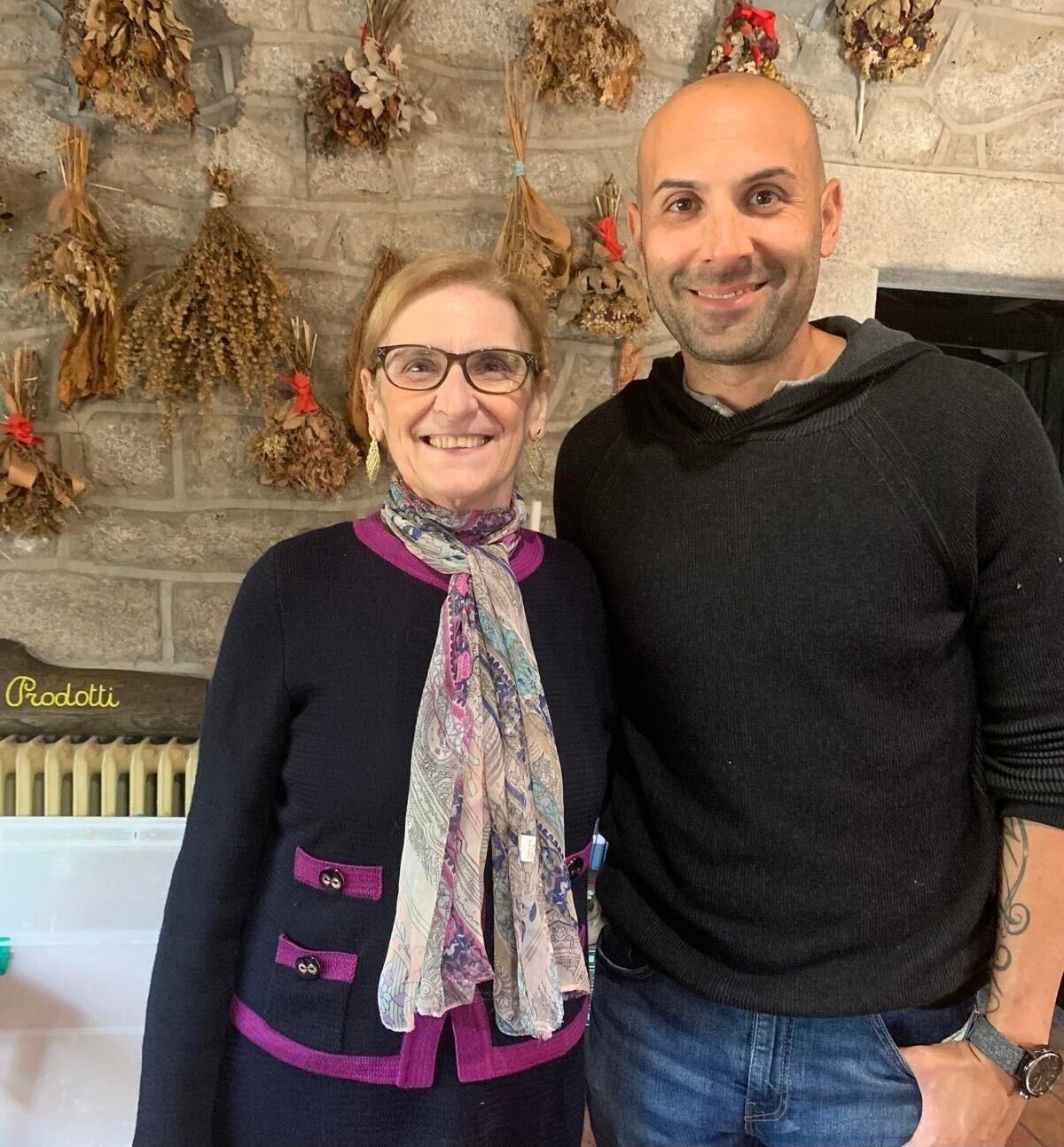 Chef Rob Gentile stands with Paola Abraini, one of the few surviving masters of <em>su filindeu</em>.