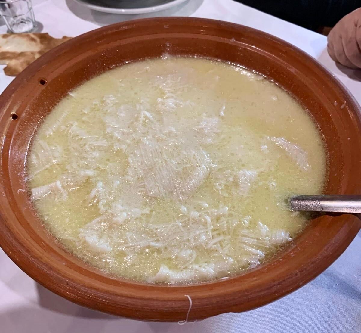 <em>Su filindeu</em> is traditionally served in a mutton broth with lots of melted Pecorino Primo Sale.