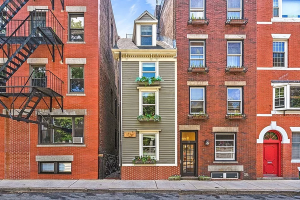 The origins of the skinny house at 44 Hull Street are uncertain.